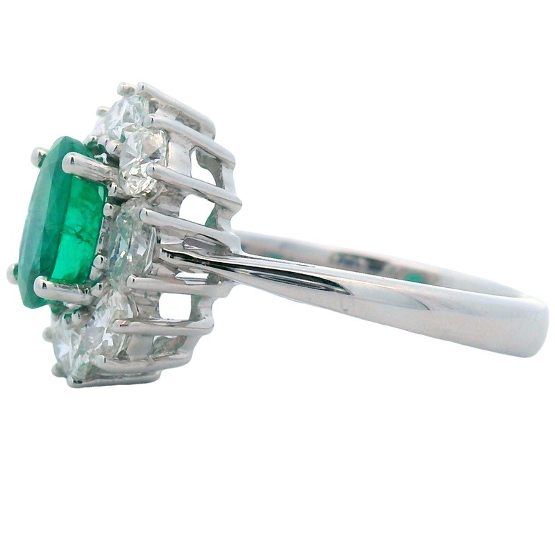 Oval Emerald and Diamond Flower Ring in 14K White Gold